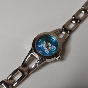 7 Inch Silver Tone Minicci Flower Watch With Blue And Green Dial